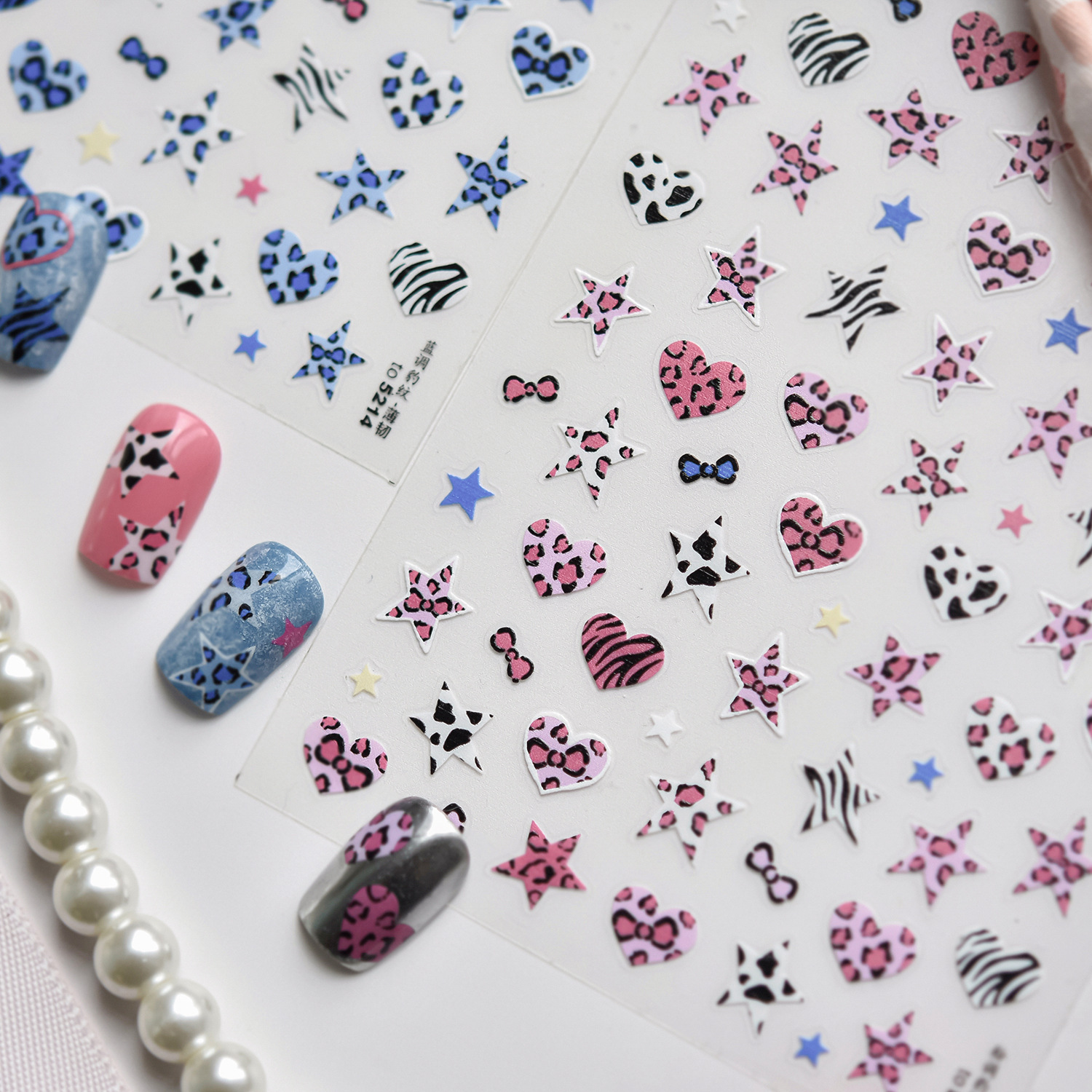 Blue And Pink Star Shaped Hear - مراجعة Nail Art Zebra Design وسعره